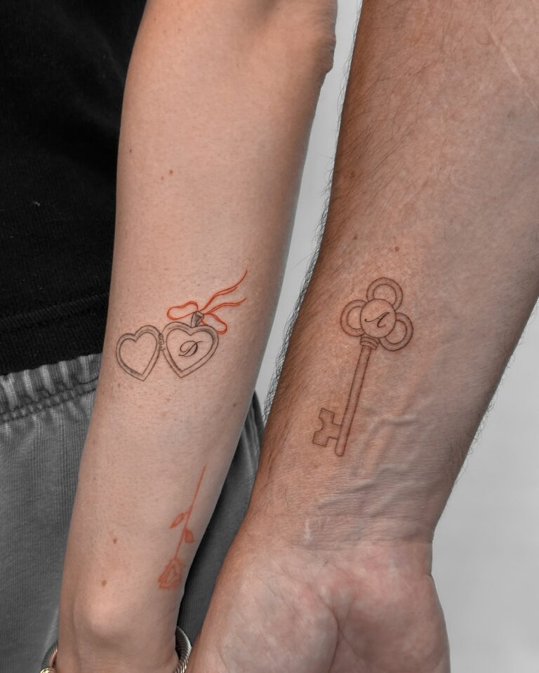 Matching father daughter tattoos