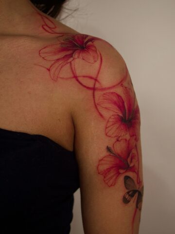 Pretty red ink tattoos for women