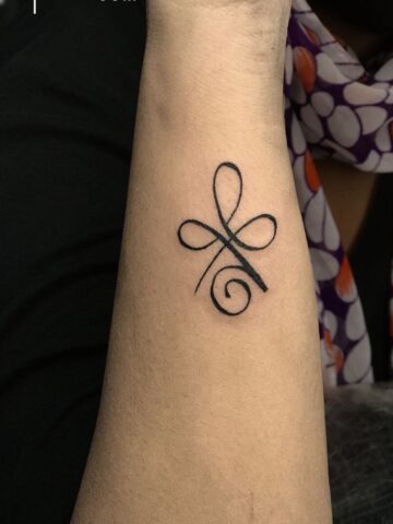 strong female tattoos