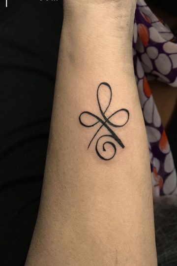 strong female tattoos